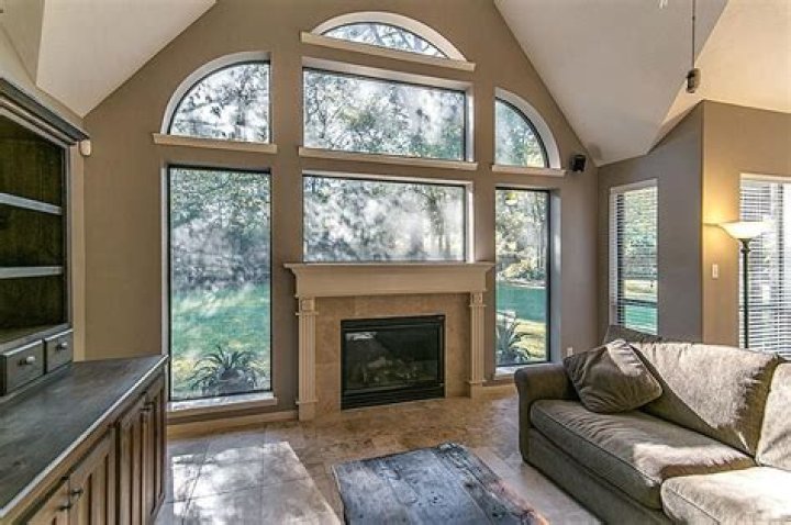 Can you put a gas fireplace under a window?