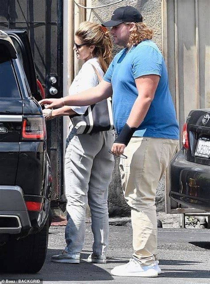 Christopher with his mother Maria and sister Katherine on a lunch date