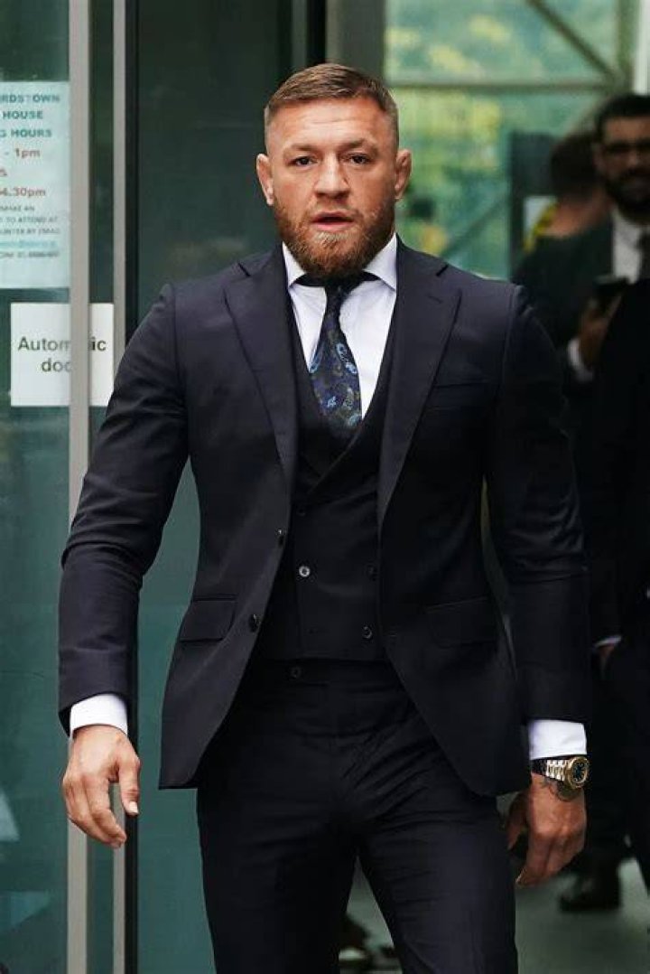 Conor Mara wearing black suit and white shirt.
