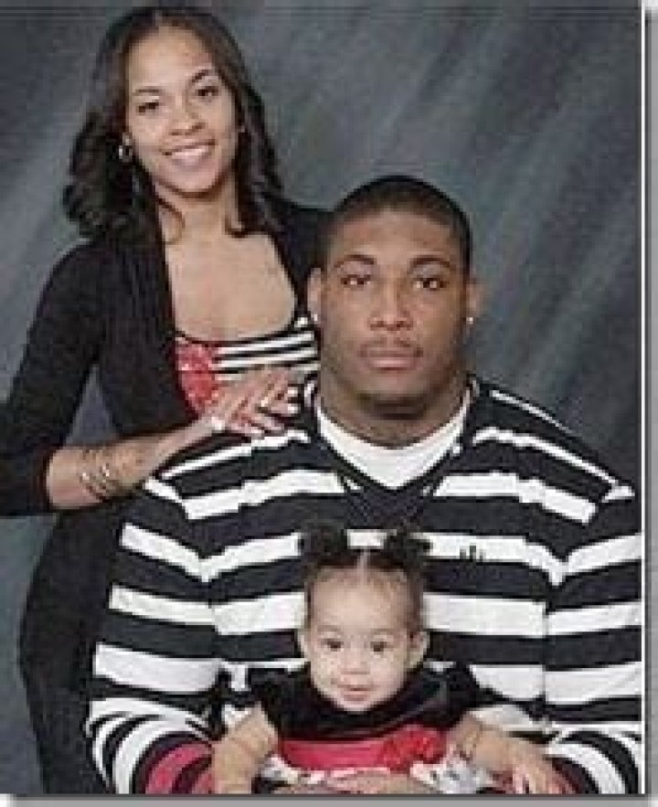 Devon Still, Channing Smythe and their daughter, Leah.