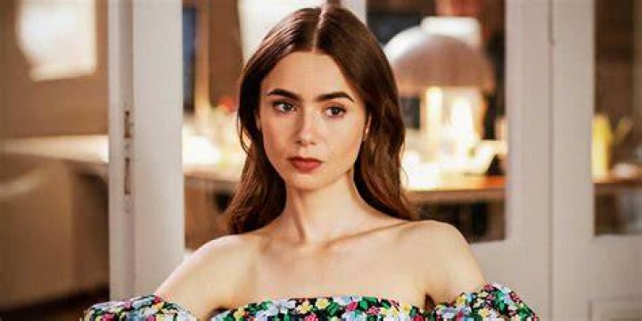 Emily in Paris. Lily Collins as Emily in episode 302 of Emily in Paris. Cr. Courtesy of Netflix © 2022 Emily in Paris. Lily Collins as Emily in episode 302 of Emily in Paris. Cr. Courtesy of Netflix © 2022
