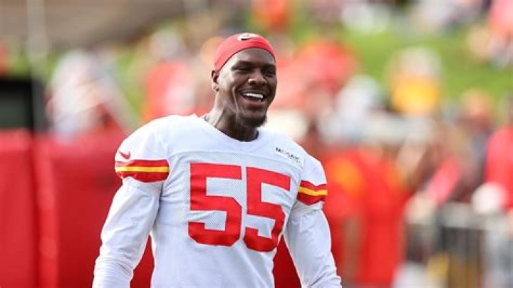 Frank Clark and His Child