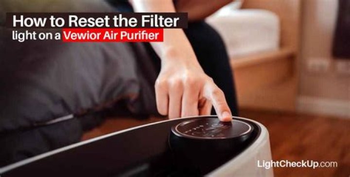 How do you reset the filter light on an air purifier?
