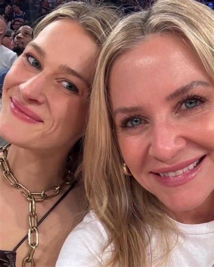 Jessica Capshaw and her spuse with their kids