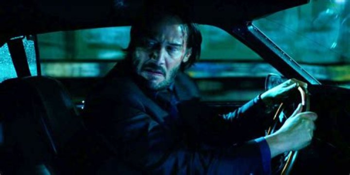 John Inside His Car (Source: Zimbio)