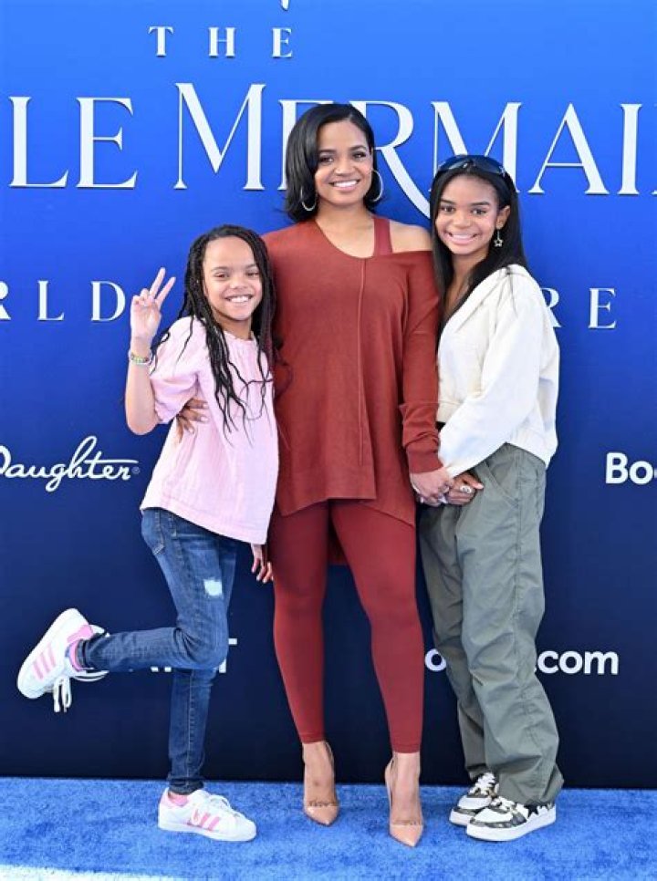 Lyric Kai Kilpatrick posing for a photo with her mother, Kyla Pratt and her younger sister, Liyah Kilpatrick.