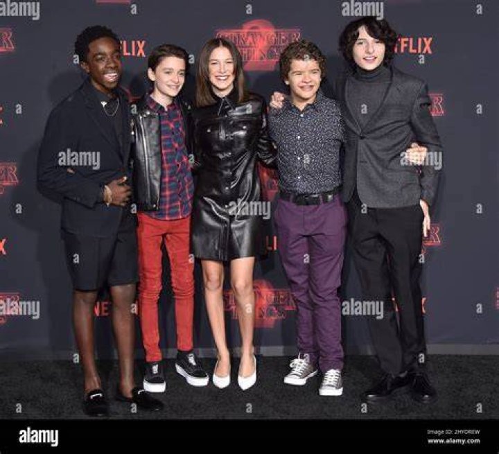 Noah Schnapp, Caleb McLaughlin, Millie Bobby Brown, Finn Wolfhard, Sadie Sink, Charlie Heaton, Natalia Dyer - Stranger Things (2019). Photo Credit: Netflix Noah Schnapp, Caleb McLaughlin, Millie Bobby Brown, Finn Wolfhard, Sadie Sink, Charlie Heaton, Natalia Dyer - Stranger Things (2019). Photo Credit: Netflix
