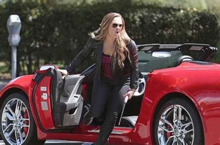 Rousey with her car
