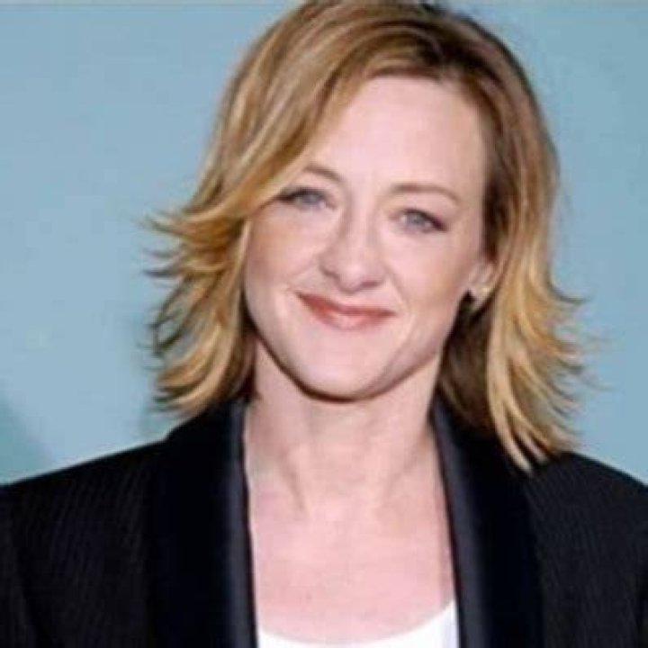 The brunette Susie Cusack has green eyes.