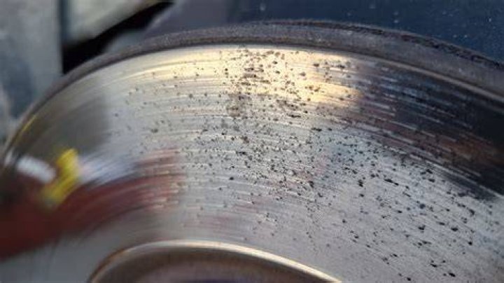 What causes pitted brake discs?